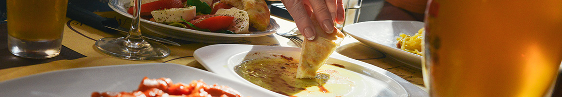 Eating Greek Mediterranean Tapas/Small Plates at Cava Mezze Rockville restaurant in Rockville, MD.